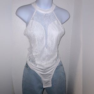 White lace open back body suit
